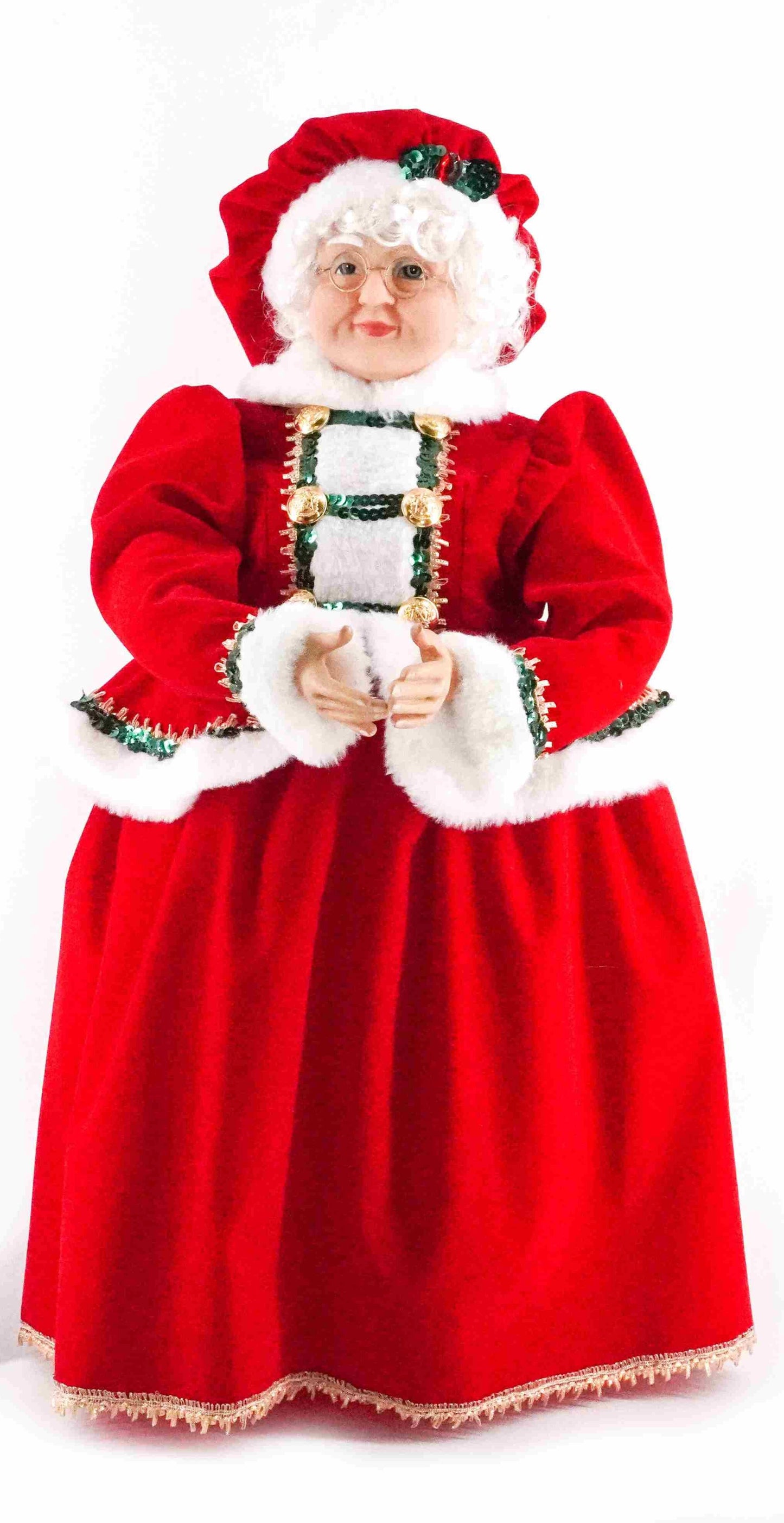 Classic Mrs Claus figurine wearing a red velvet dress with white faux fur trim and green ribbon accents