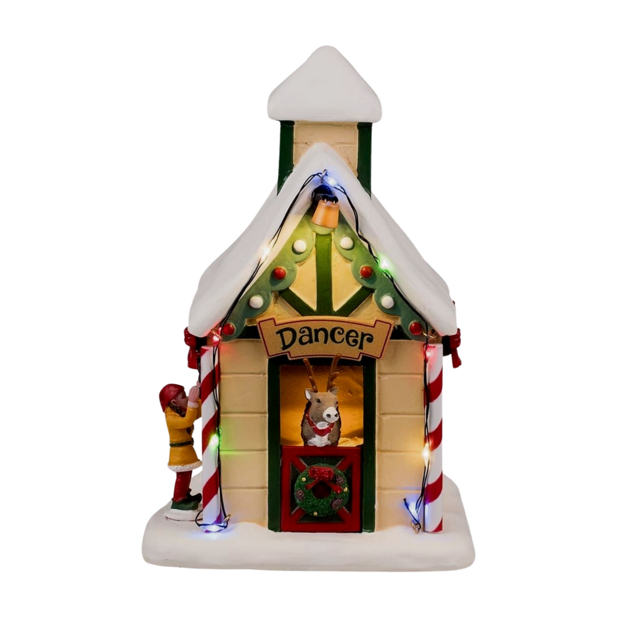 Front of Dancer's reindeer stable village building with multicoloured lights, lit tree gable, Dancer in doorway, and elf figurine
