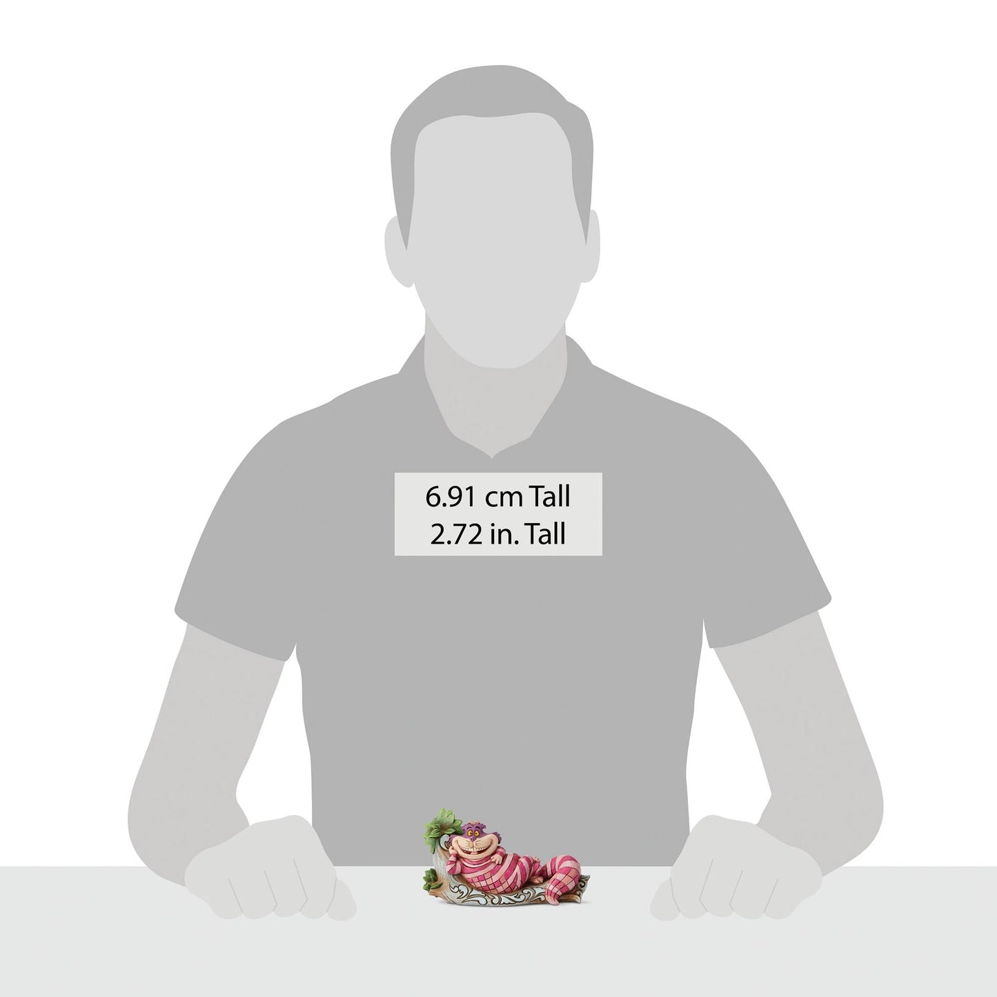 Size reference showing Cheshire Cat log figurine beside a human silhouette, labelled 6.91 cm / 2.72 inches tall