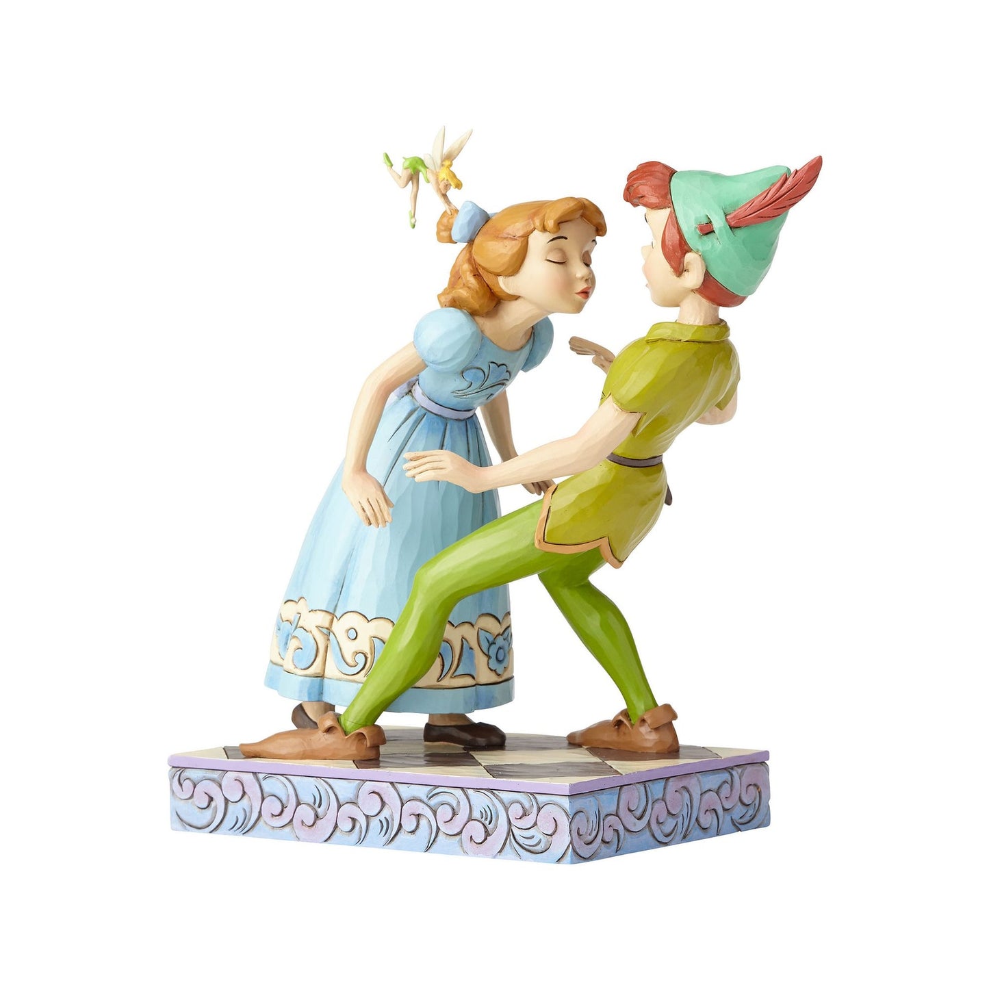 Peter Pan and Wendy figurine angled view, Peter leaning back with surprised expression, Tinker Bell above Wendy, cloud scroll base