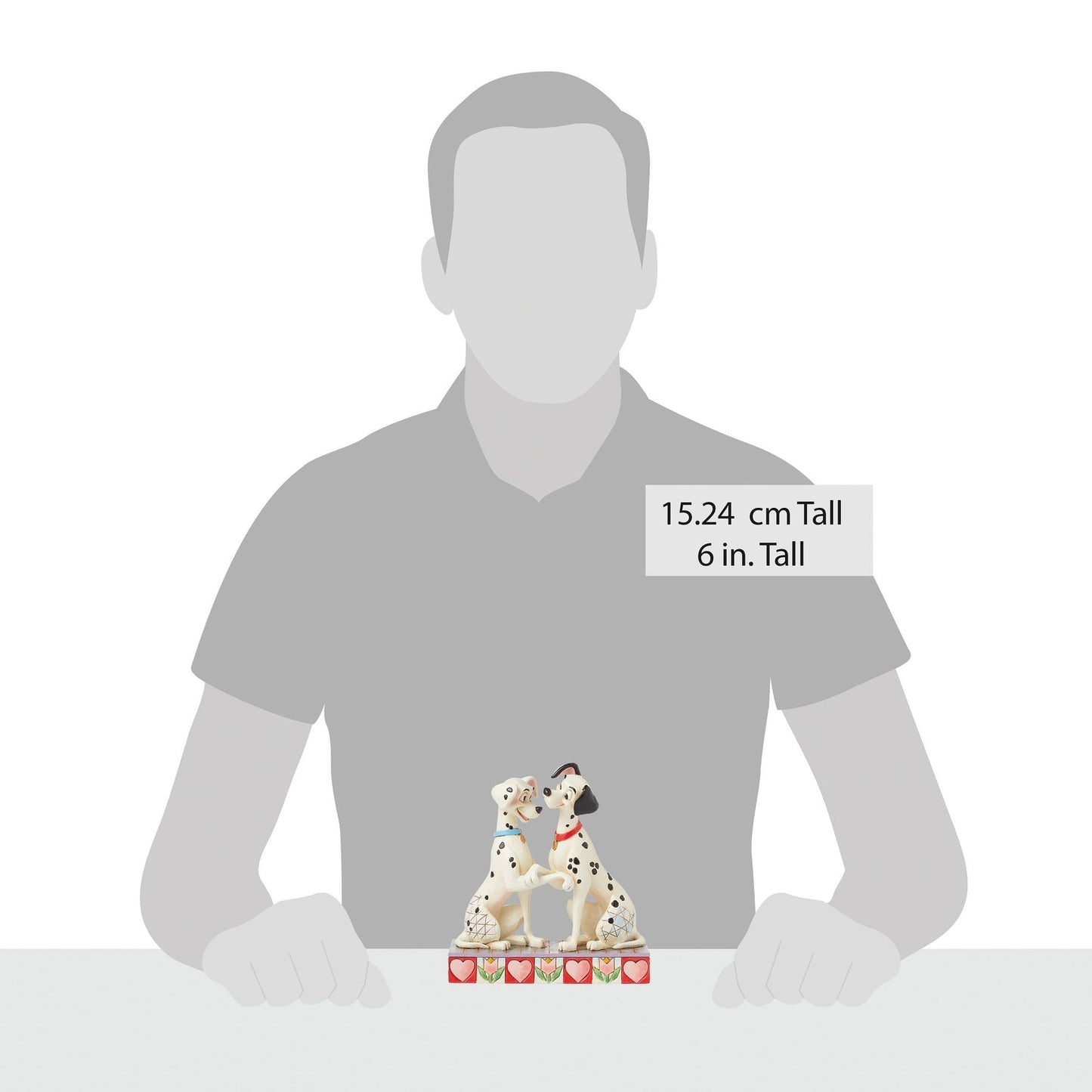 Pongo and Perdita figurine size comparison with adult male silhouette, 15.24cm / 6 inches tall