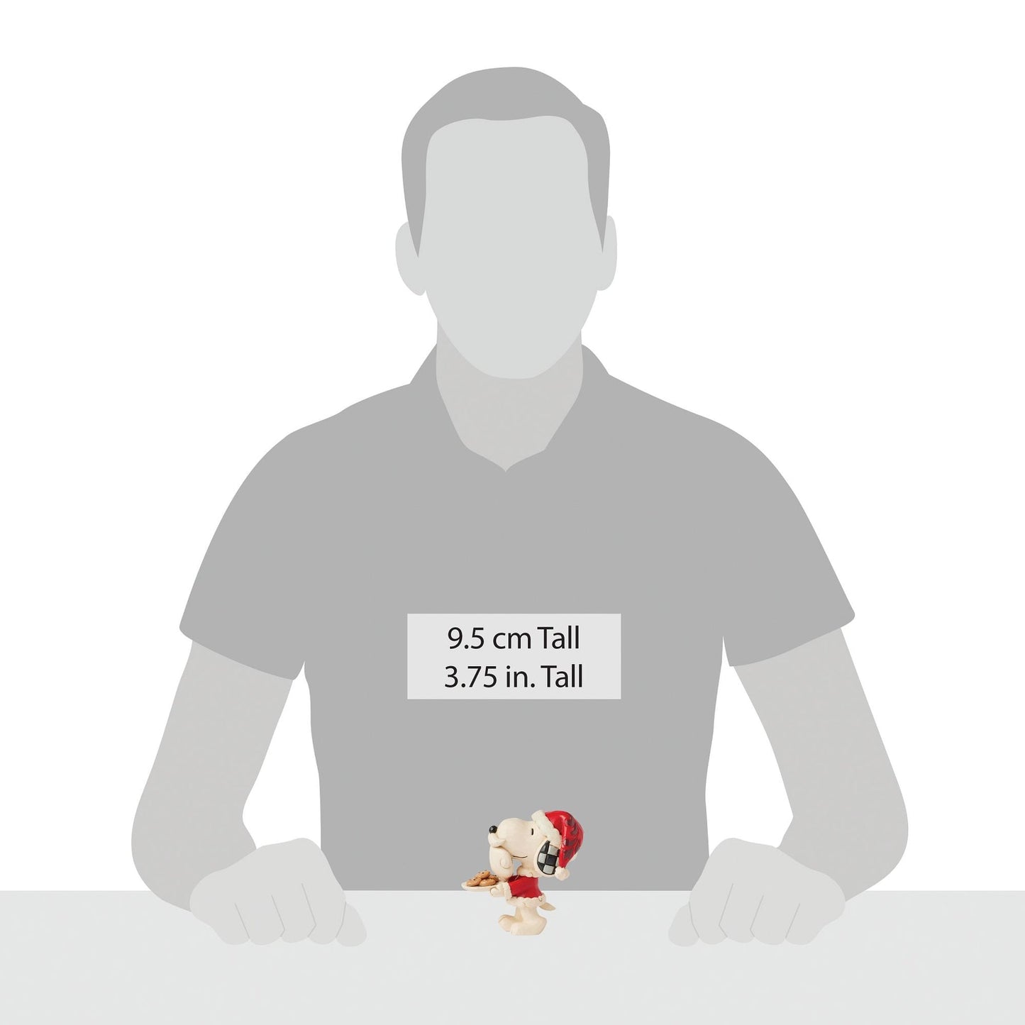 Scale reference Snoopy elf figurine shown beside human silhouette for scale, measuring 9.5 cm / 3.75 inches tall