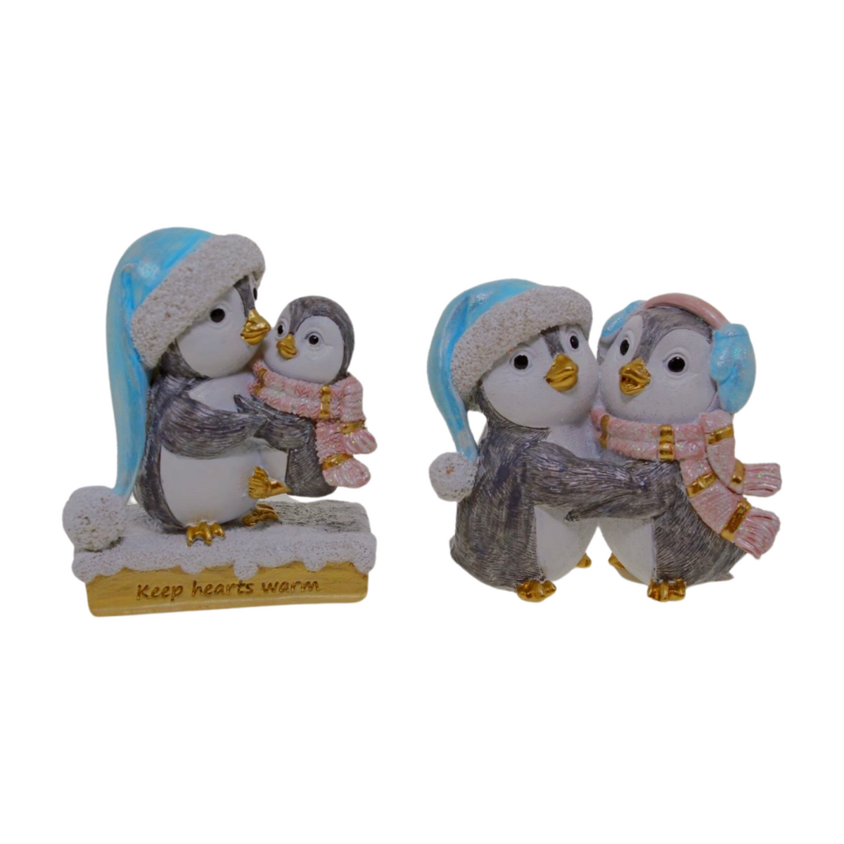 Two penguin Christmas decorations featuring parent and chick pairs wearing blue hats and pink scarves