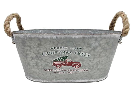Metal Christmas tub with rope handles, decorated with a vintage red truck carrying a Christmas tree
