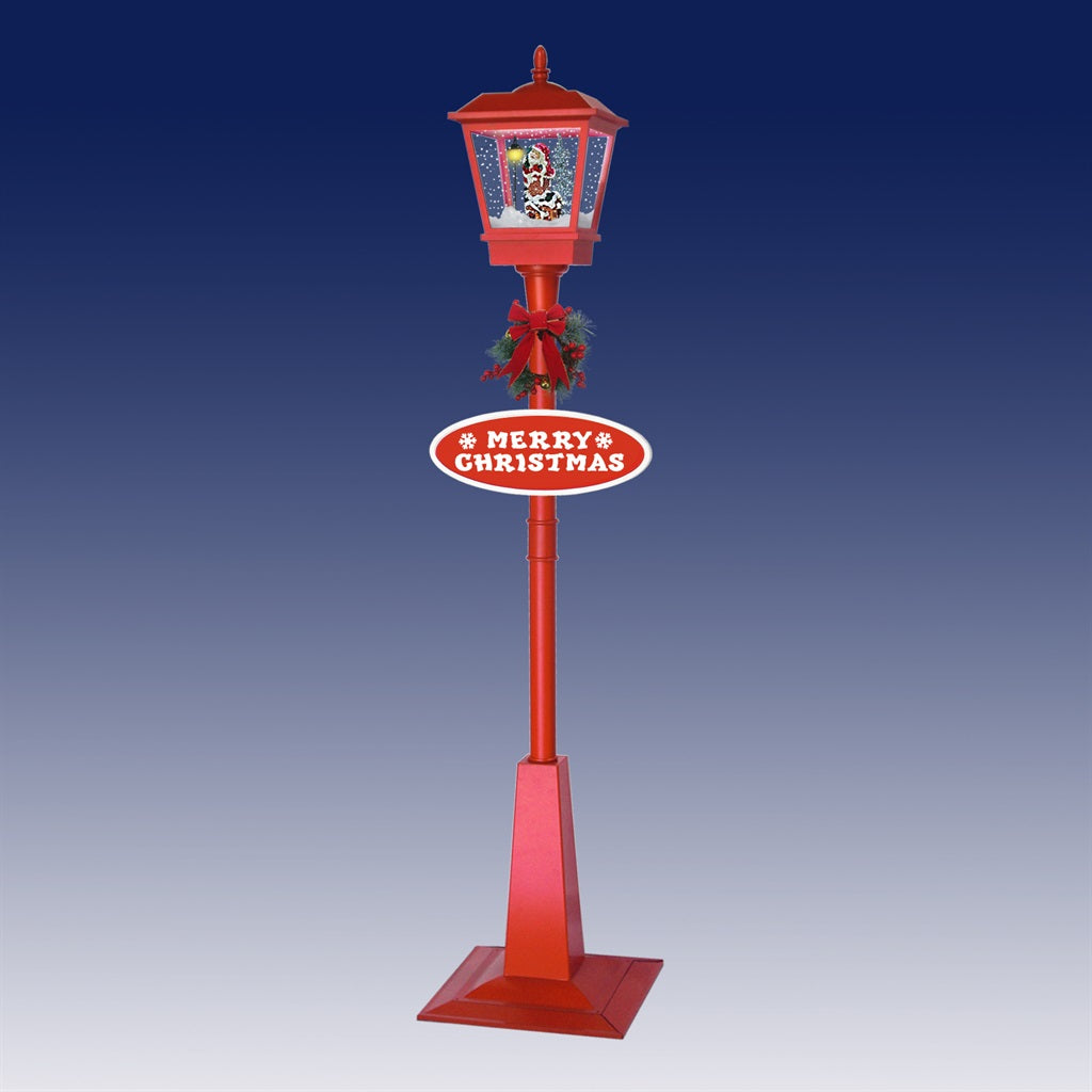 Red musical snowing lamp post with Santa scene, Merry Christmas sign and festive wreath decoration