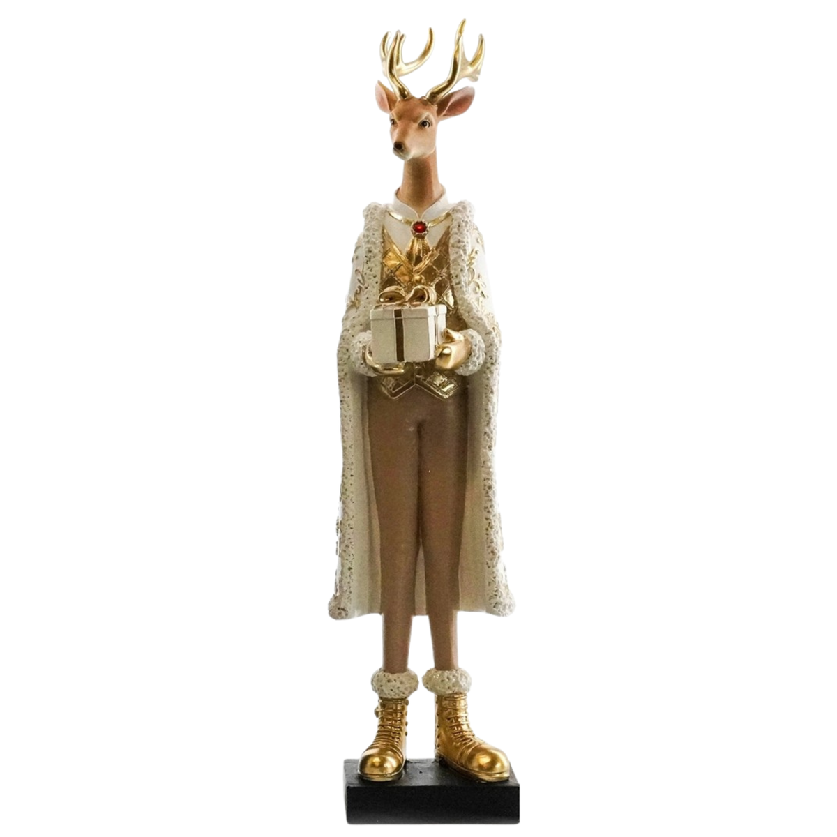 A decorative Christmas tree figurine shaped like a stag deer dressed in a long cream lace-trimmed cape, brown suit, and gold boots, holding a gift box on a black base against a white background.