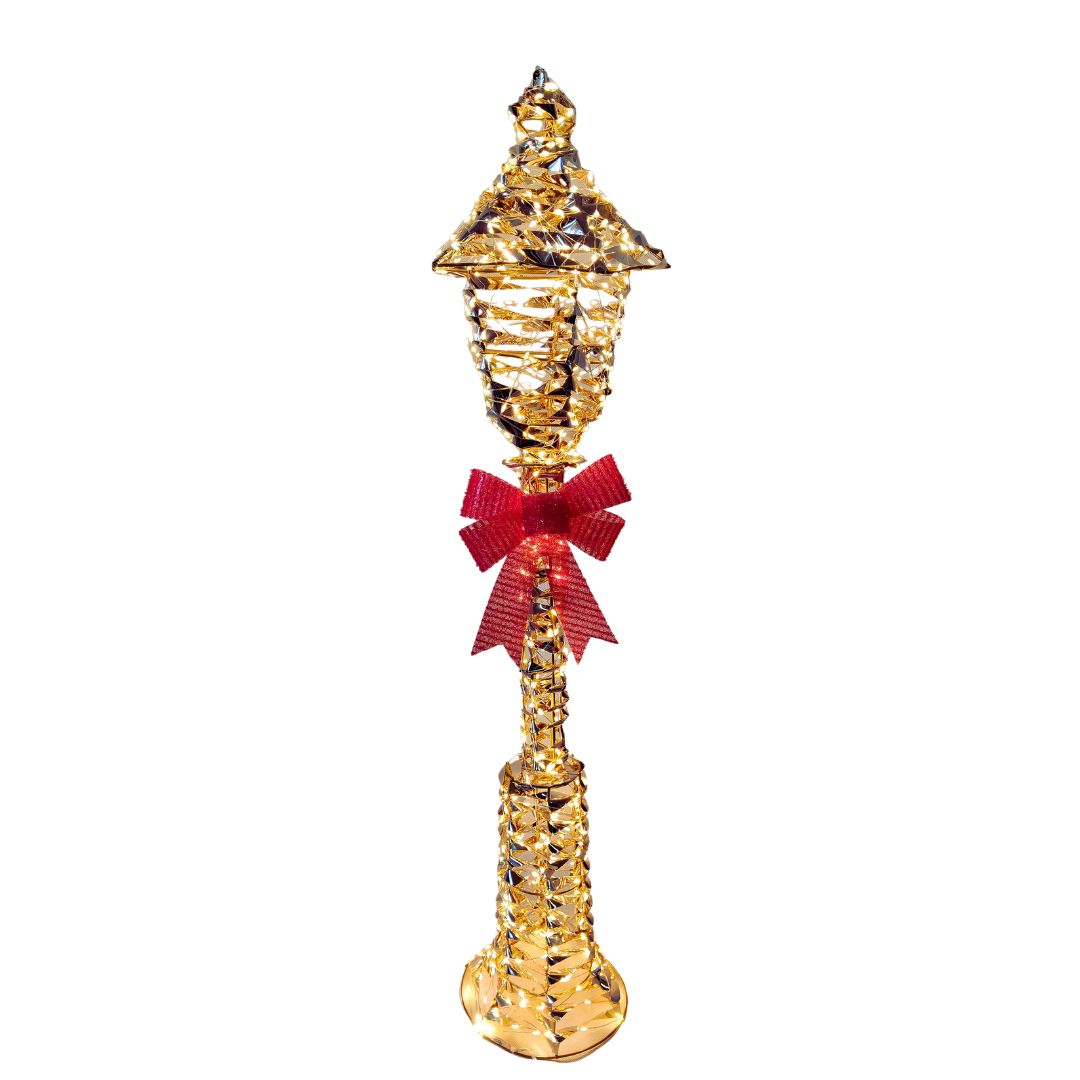 Gold light-up Christmas lantern with red bow and warm LED lights