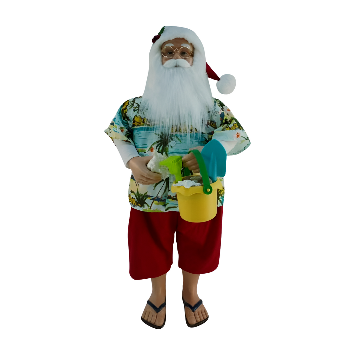 Beach-themed Santa figurine wearing a Hawaiian shirt, red shorts, jandals, and holding a yellow beach bucket and shovel