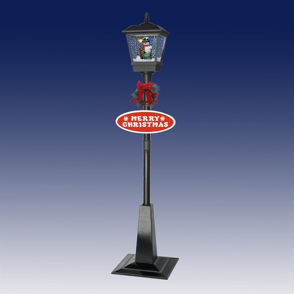 Black musical snowing lamp post with snowman scene, Merry Christmas sign and festive wreath decoration