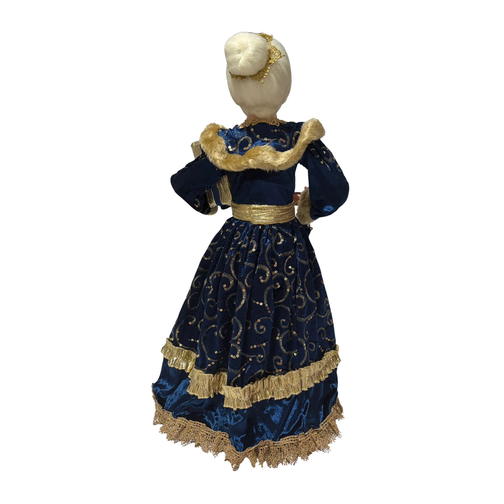 Mrs Claus wearing a blue dress with gold accents, holding two presents in one hand and a blue handbag in the other
