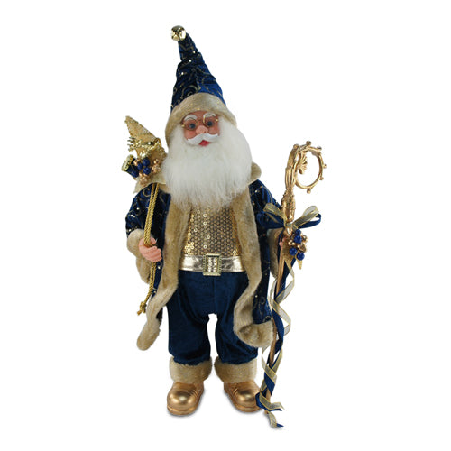Standing Santa Claus wearing royal blue with gold accents, holding a sack of presents and a gold staff