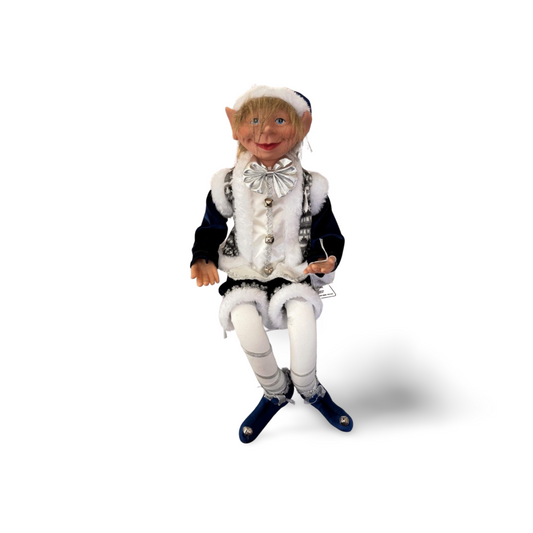 Blue and silver sitting elf figurine with white fur trim, silver bow tie, and navy outfit