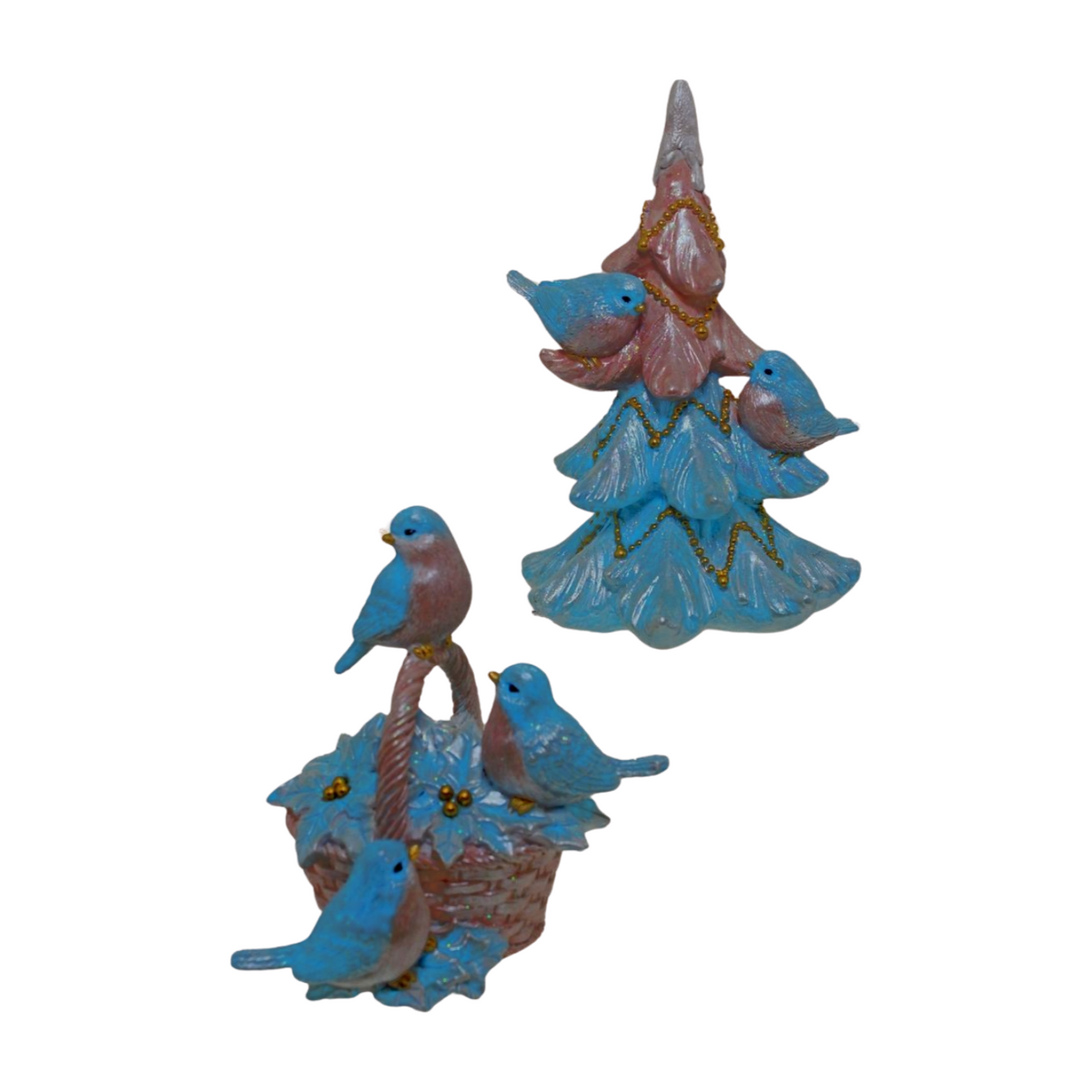 Christmas decorations featuring bluebirds — one perched on a Christmas tree and one gathered by a basket with holly accents