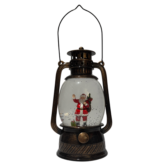 bronze Christmas lantern snow globe featuring Santa holding a Christmas tree and gifts with swirling glitter.