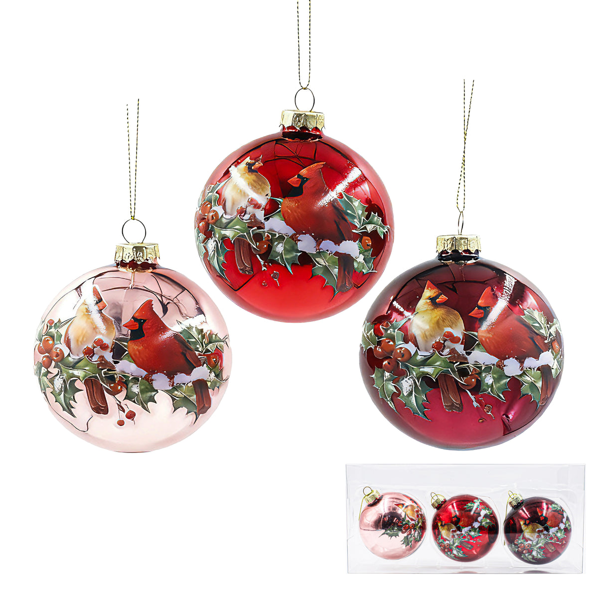 Set of three cardinal and holly glass baubles in pink, red and fuchsia with gold caps, in gift box