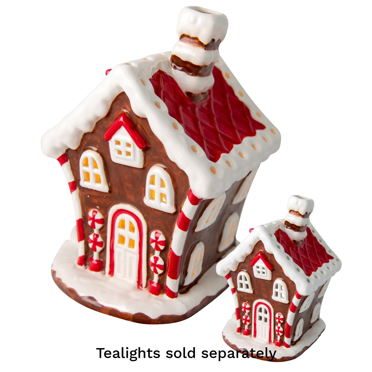 Large ceramic gingerbread house tealight holder with red tiled roof, candy cane door and peppermint lollipop detail