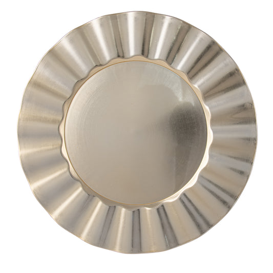 Champagne ridged charger plate with scalloped-edge bowl, shot from above on white background