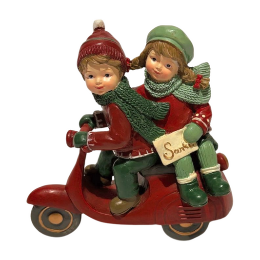Children on a Scooter to Post a Letter to Santa