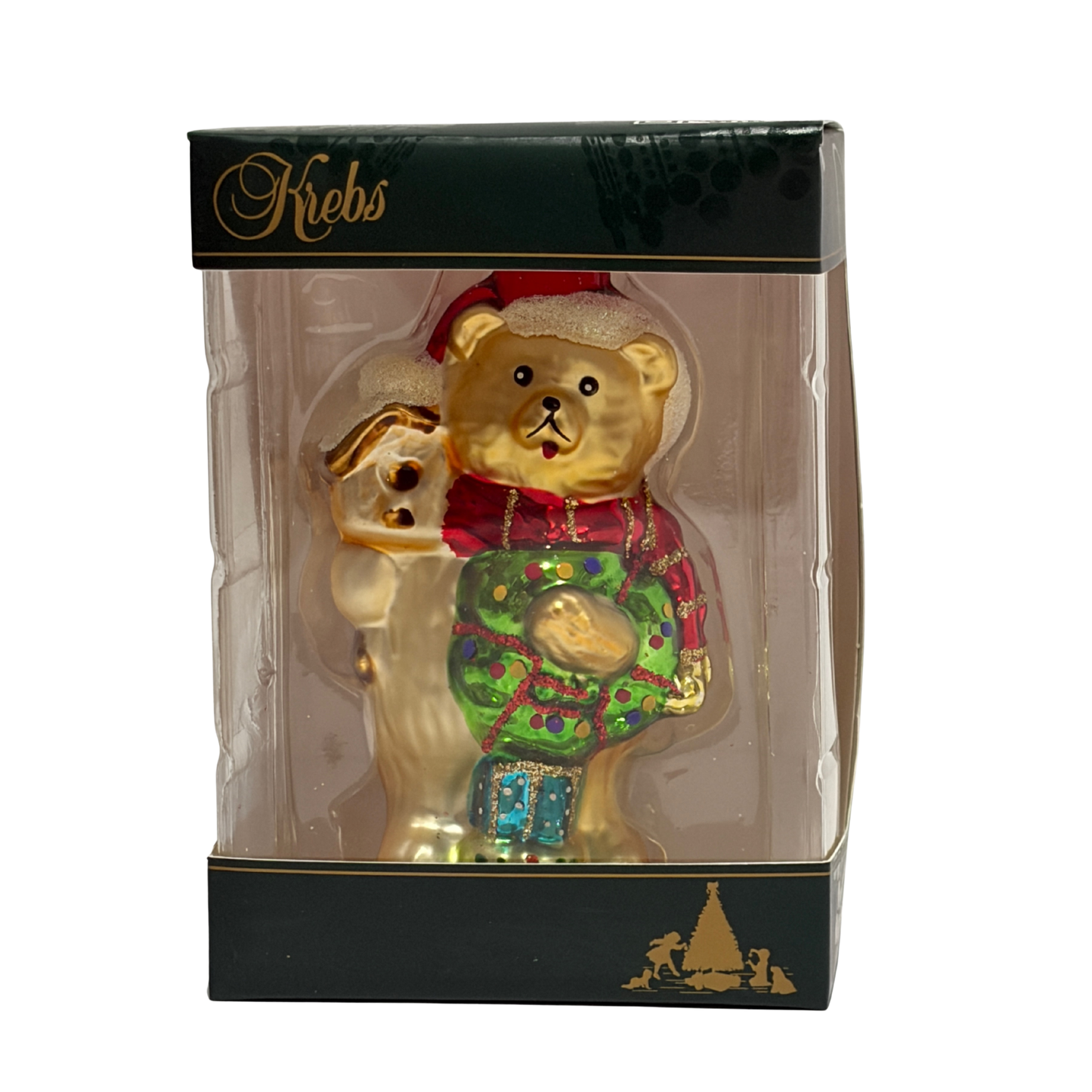 Decorative bear figurine in a transparent box with 'Krebs' branding.