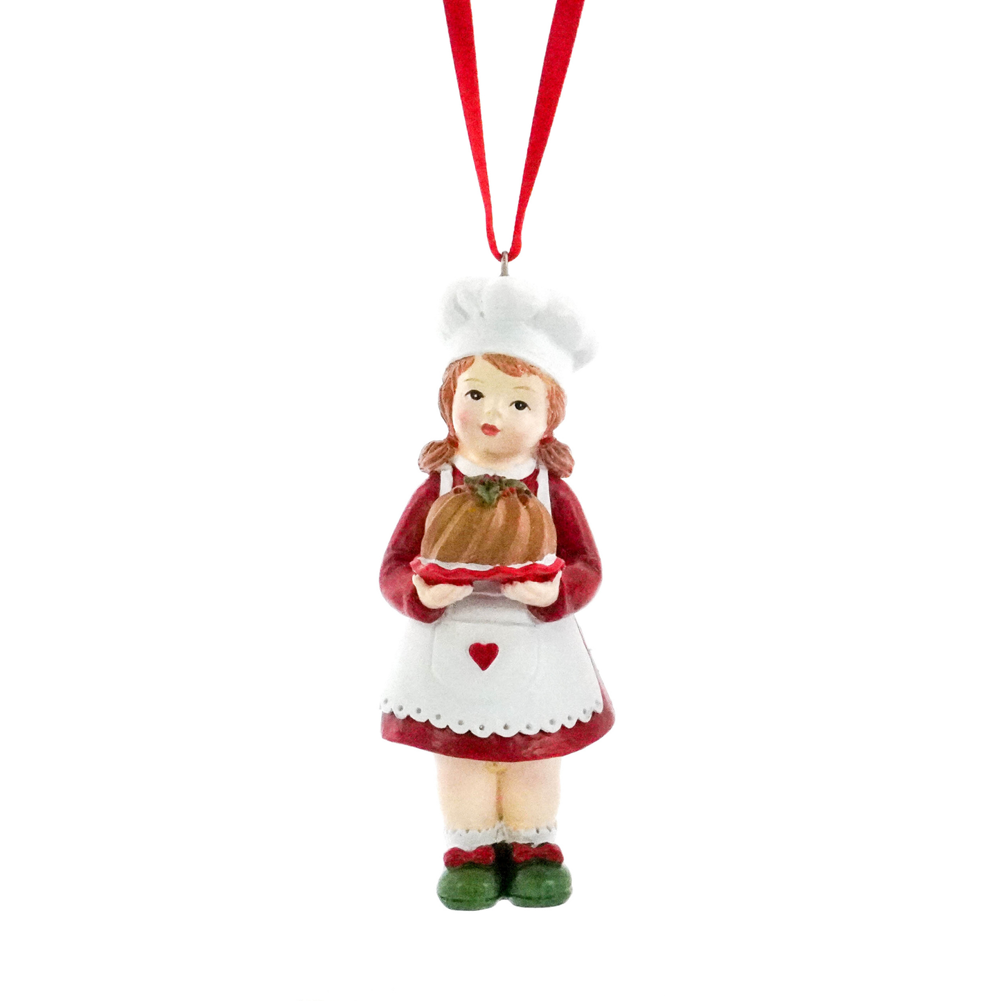 Christmas tree decoration of a girl chef in red dress and white apron holding a Christmas pudding