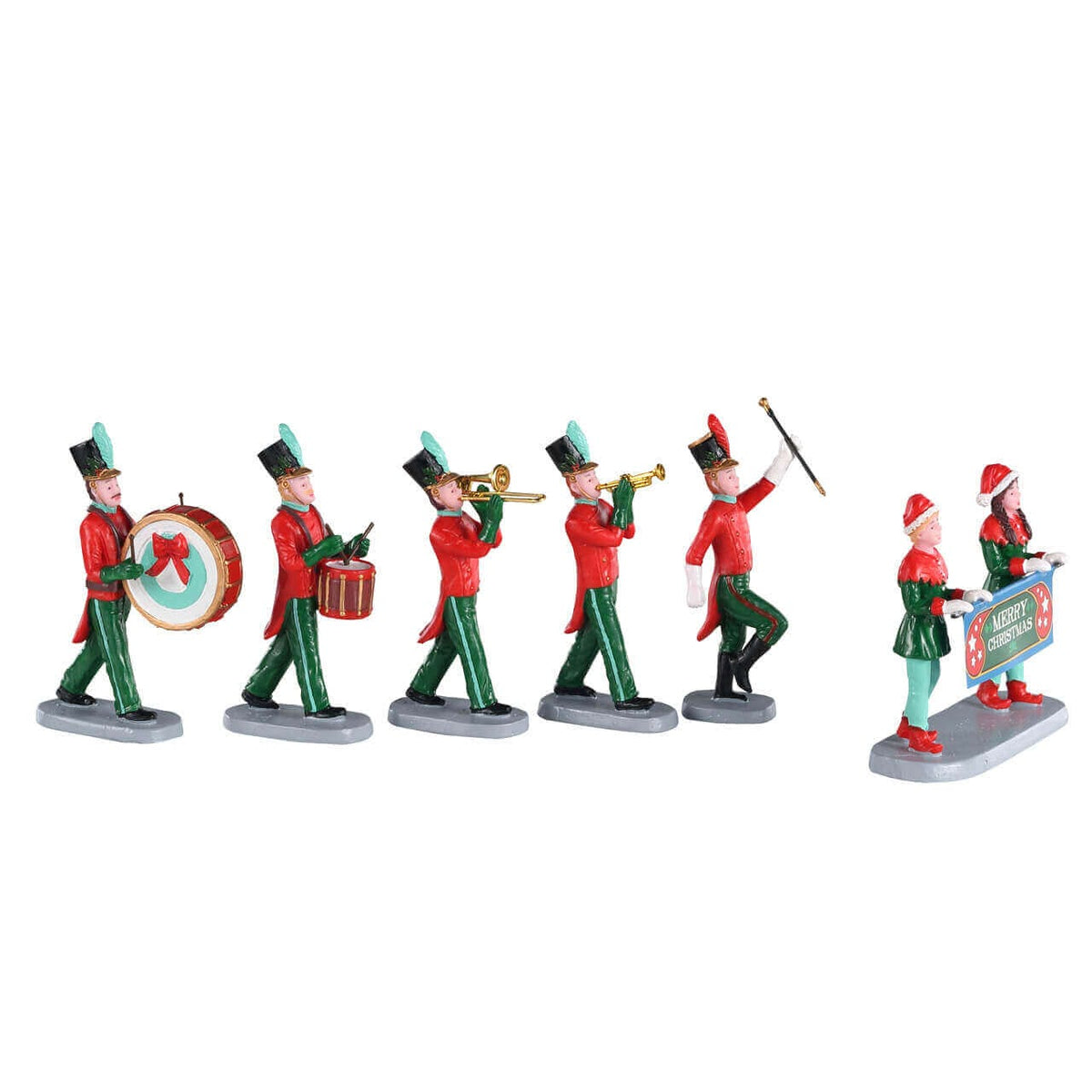 Lemax marching band figures in red and green uniforms with elves carrying a Merry Christmas banner