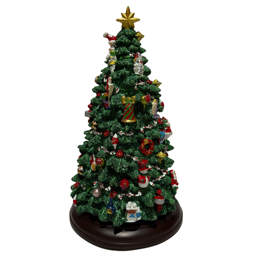Musical Christmas tree with colourful ornaments, candy canes, presents, and golden star topper
