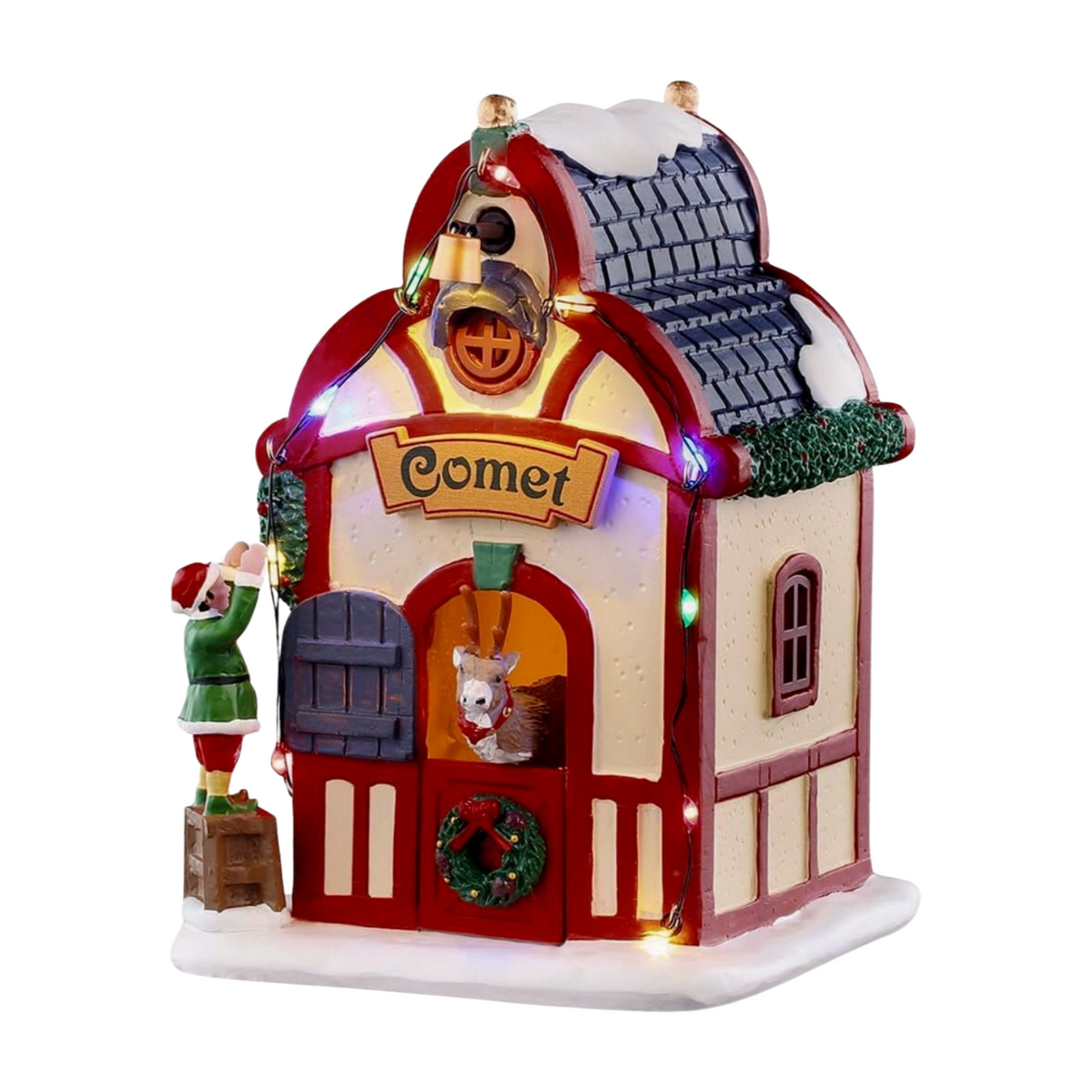 Front of Comet's reindeer stable village building with red domed roof, Comet sign, reindeer in doorway, and elf figurine on a crate