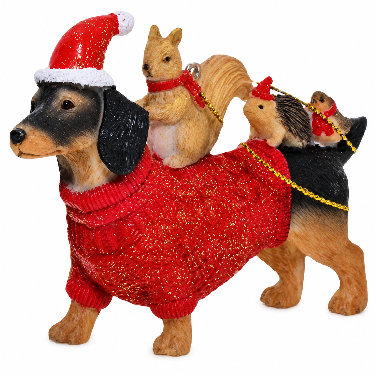 Dachshund tree decoration in red glitter jumper and Santa hat with squirrel, hedgehog and robin passengers on his back