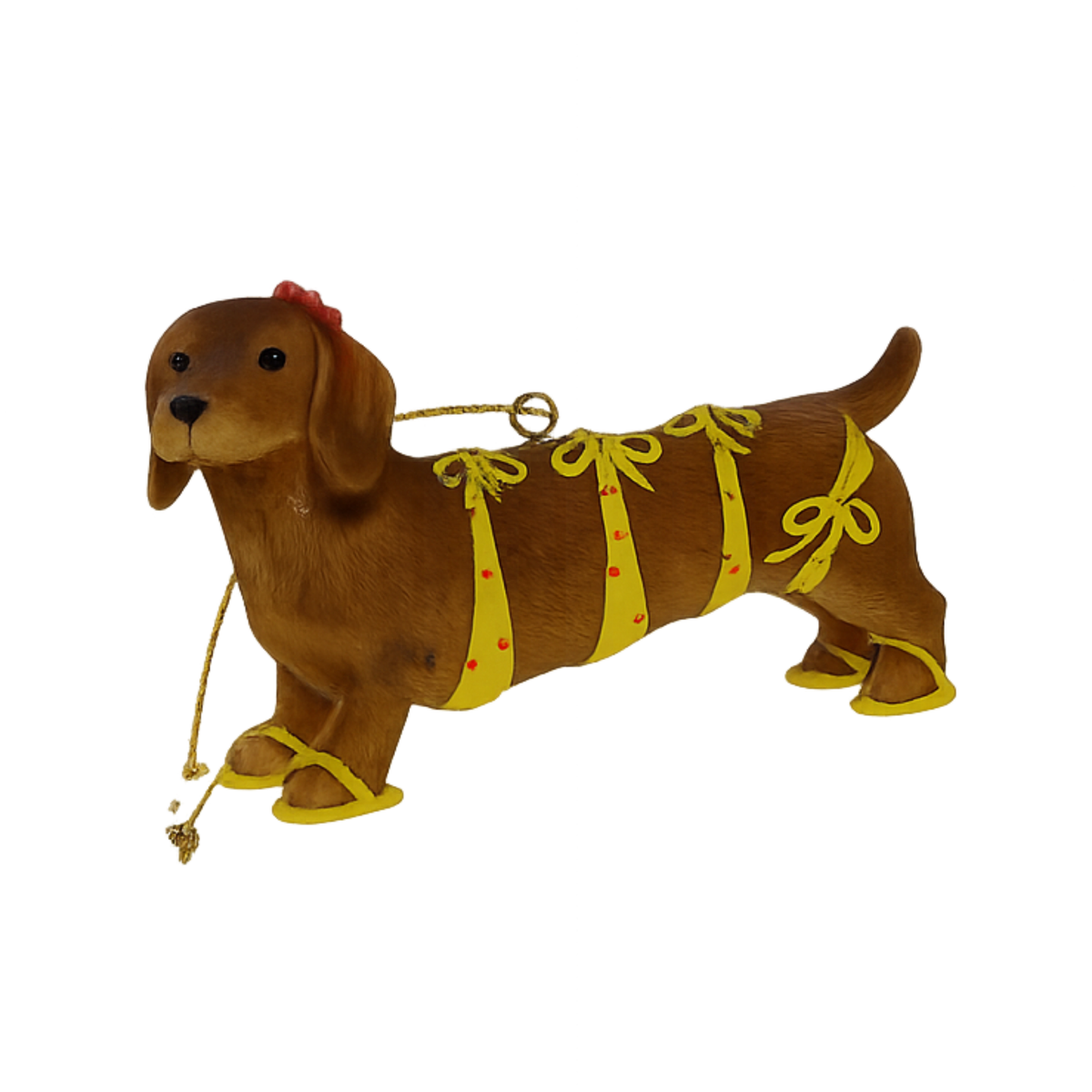 Tan dachshund Christmas tree decoration wearing a yellow polka dot bikini with bow ties and matching sandals