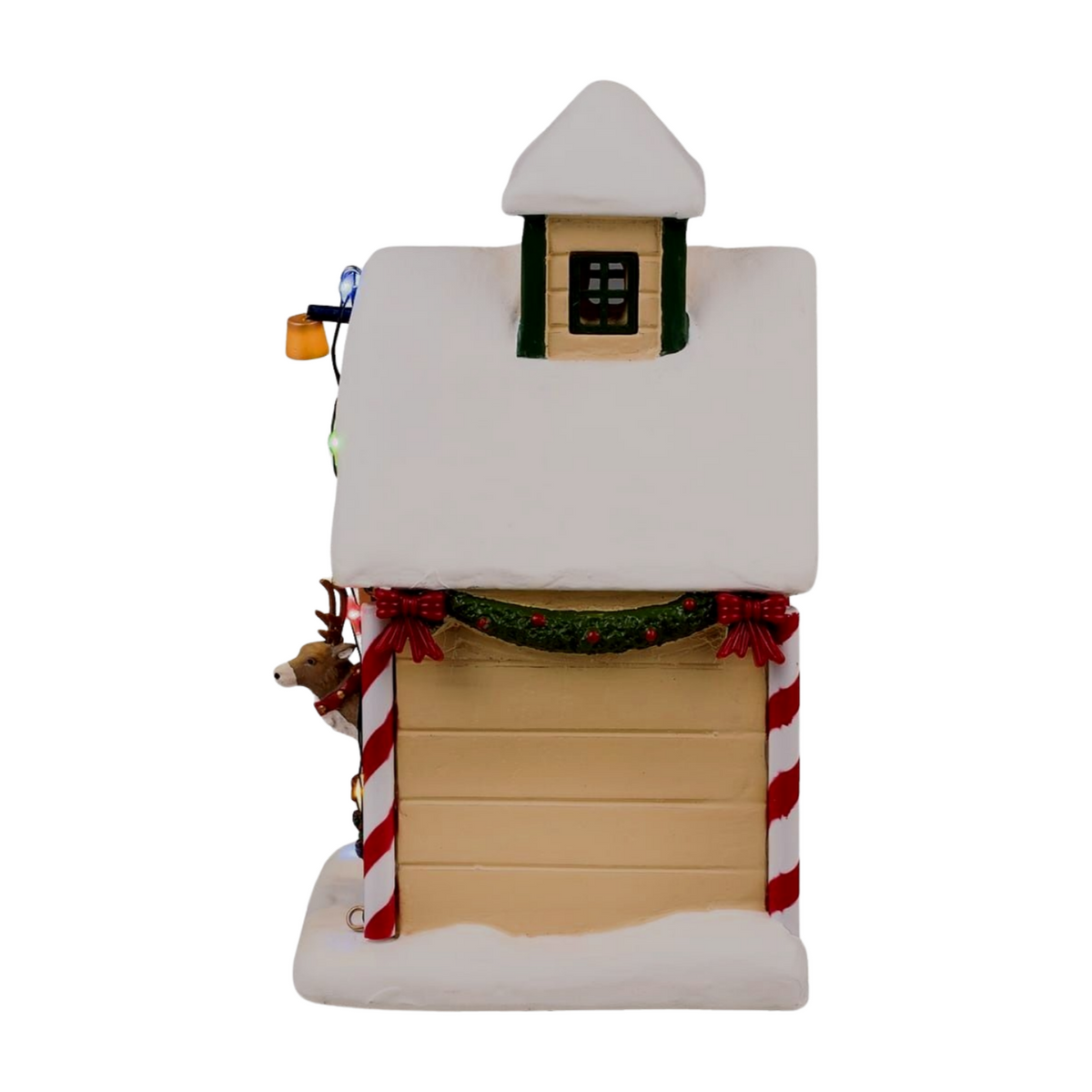 Left of Dancer's reindeer stable village building with multicoloured lights, lit tree gable, Dancer in doorway, and elf figurine