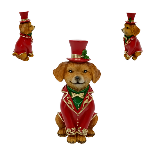Golden dog figurine in red Christmas tailcoat, green waistcoat and red top hat with holly