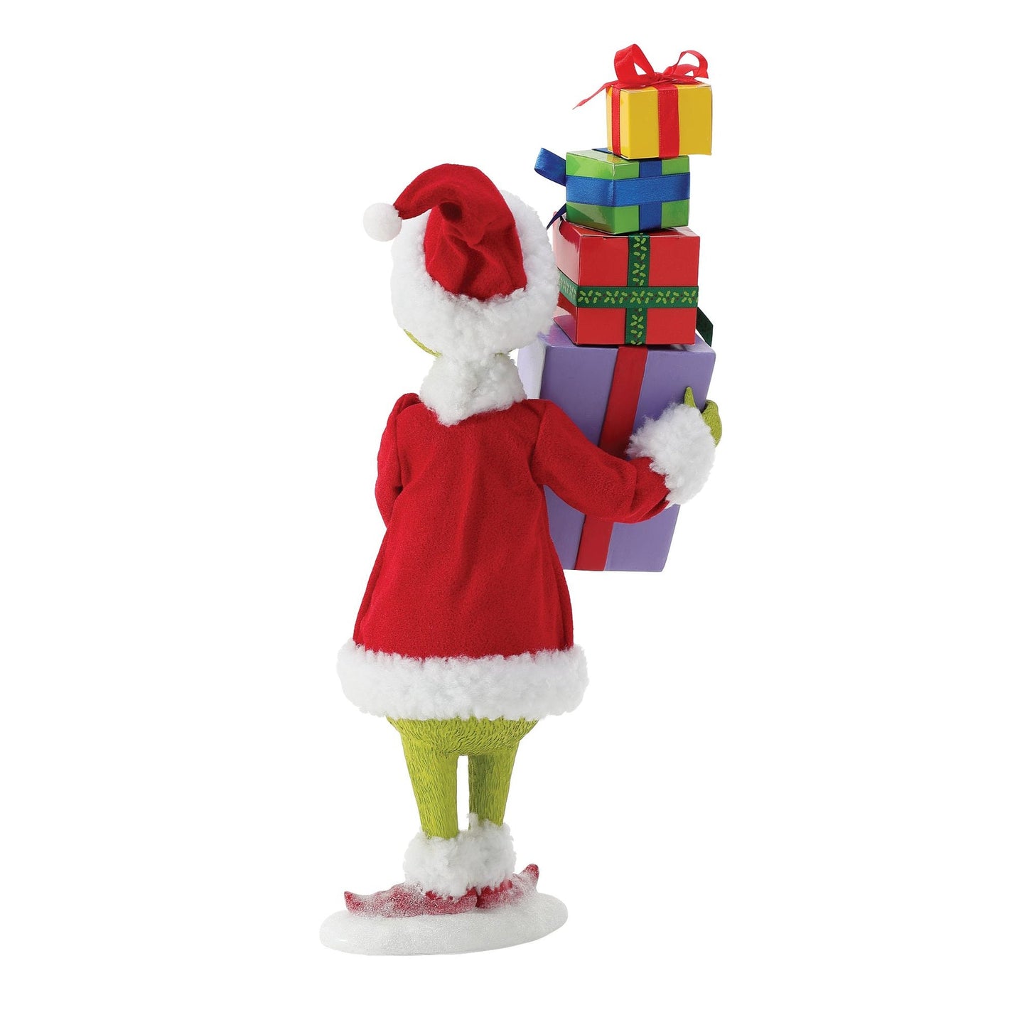 Rear view of Grinch figurine in red Santa suit and hat, carrying a tall stack of colourful wrapped gifts on a snowy base