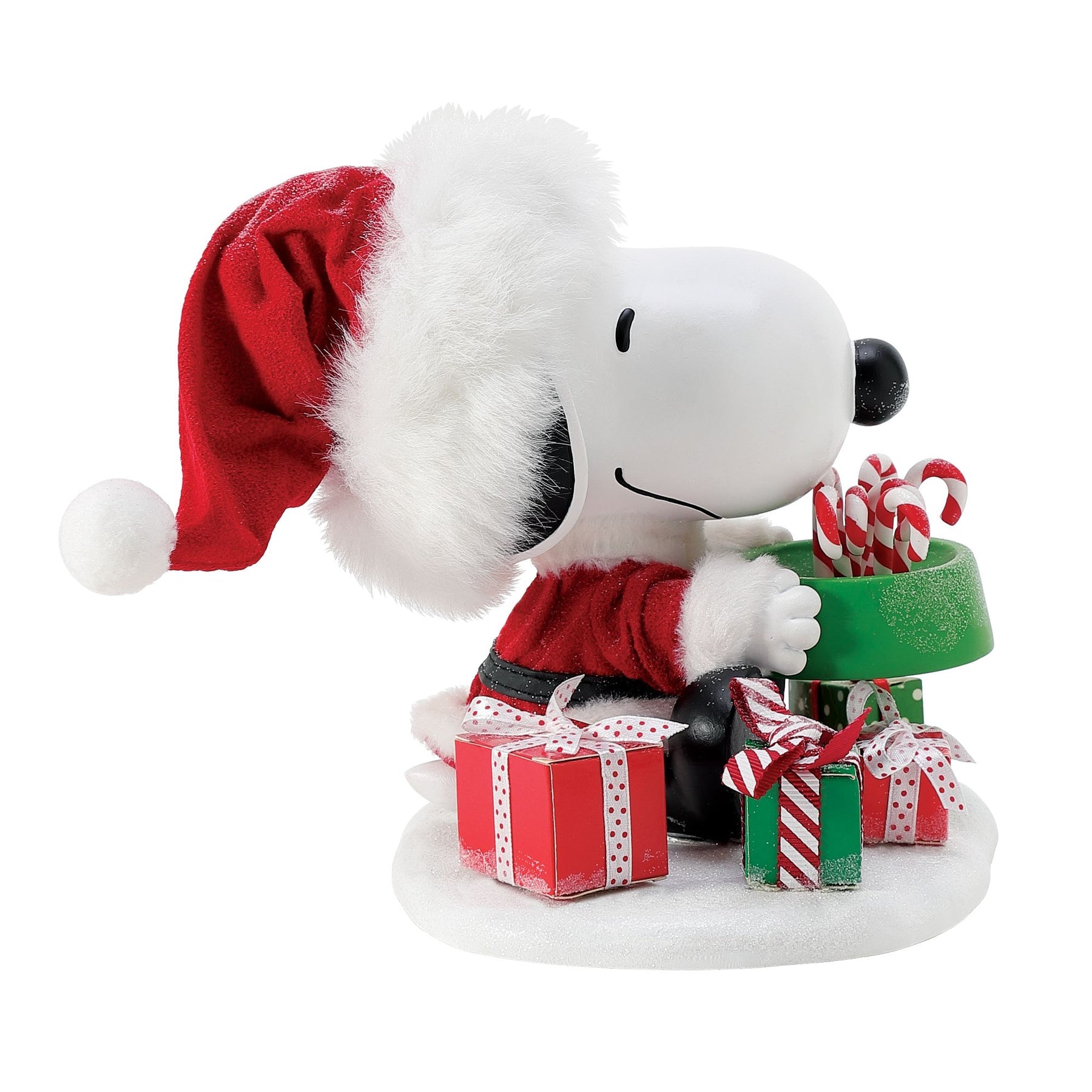 Snoopy Santa figurine, left-side view, hugging green dog bowl of candy canes with red and green gift boxes at his feet