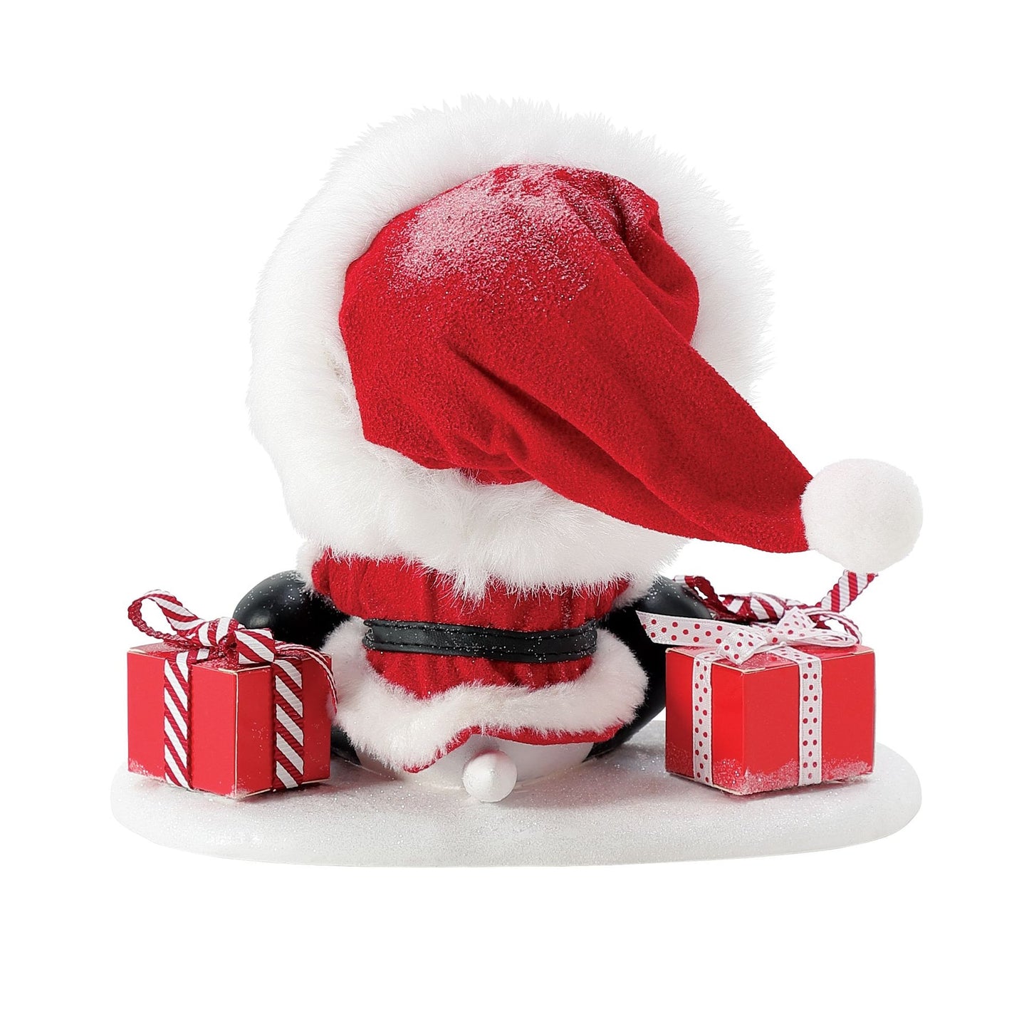 Rear view of Snoopy Santa figurine showing red Santa hat with white trim and pompom, flanked by two wrapped red gift boxes