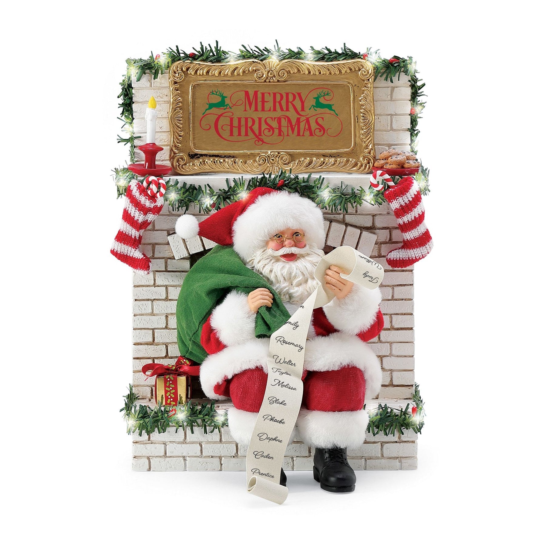 Front view of Santa seated on a lit garland-trimmed fireplace reading a long naughty-or-nice list; gold "Merry Christmas" sign above the mantel