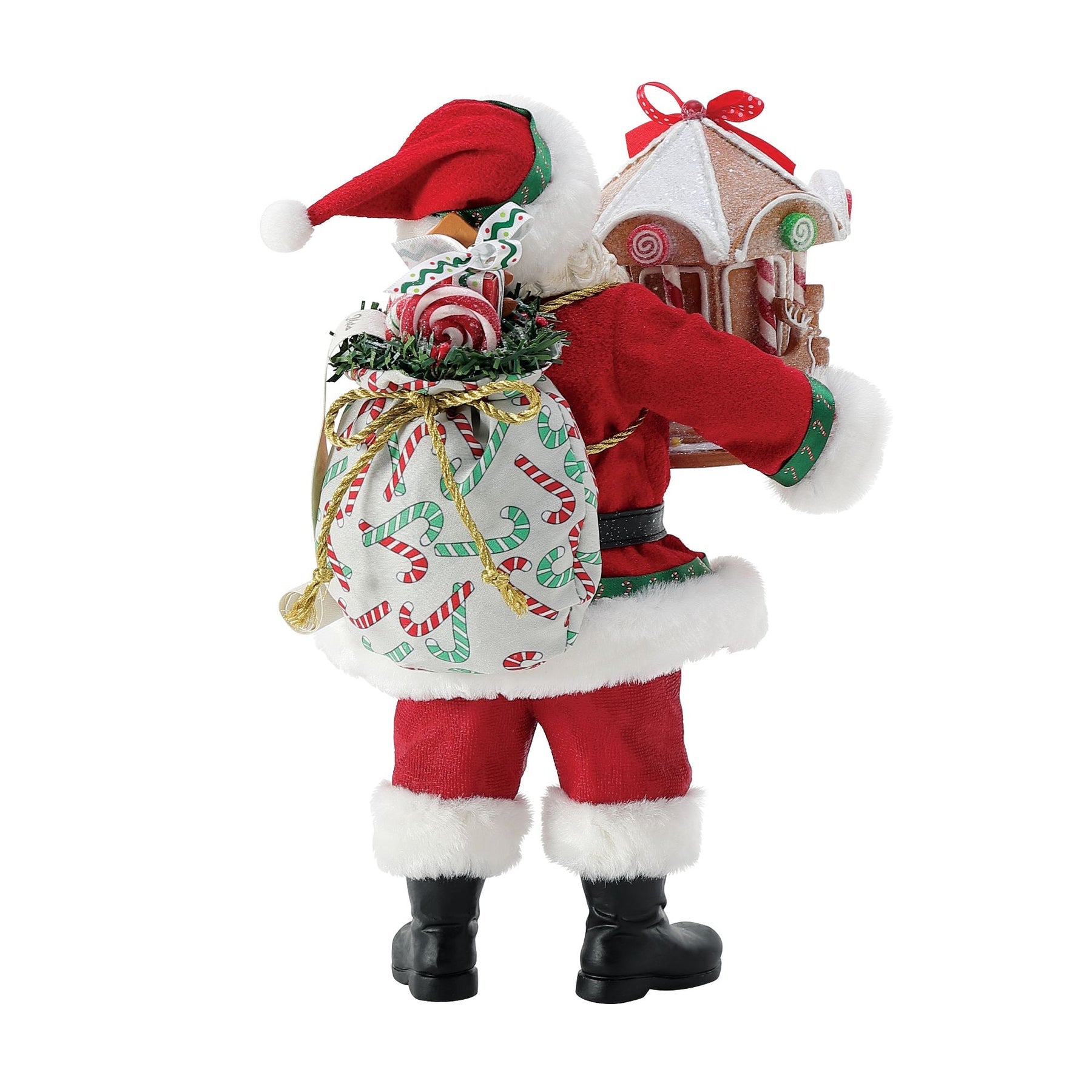 Rear view of Santa figurine carrying a candy cane–printed gift sack overflowing with presents, holding a decorated gingerbread carousel