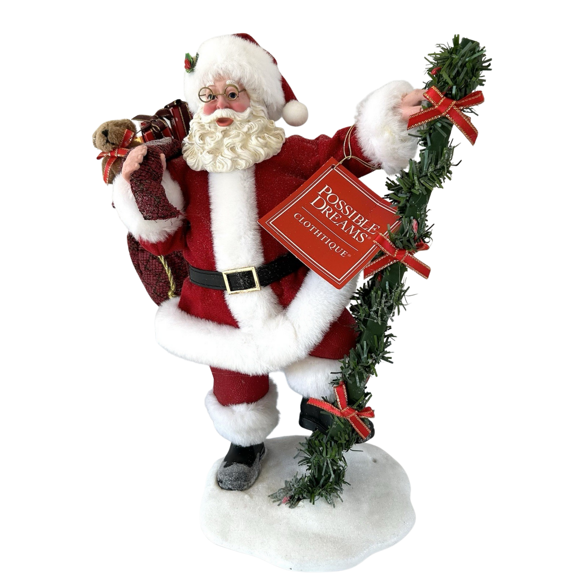 Front view of a Possible Dreams Santa figure holding a garland-wrapped ladder and a burgundy gift sack with teddy bear, on a snow base