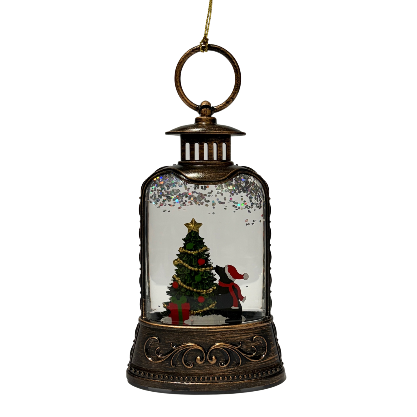 Mini lantern with a dog in a Santa hat looking at a decorated Christmas tree and swirling glitter