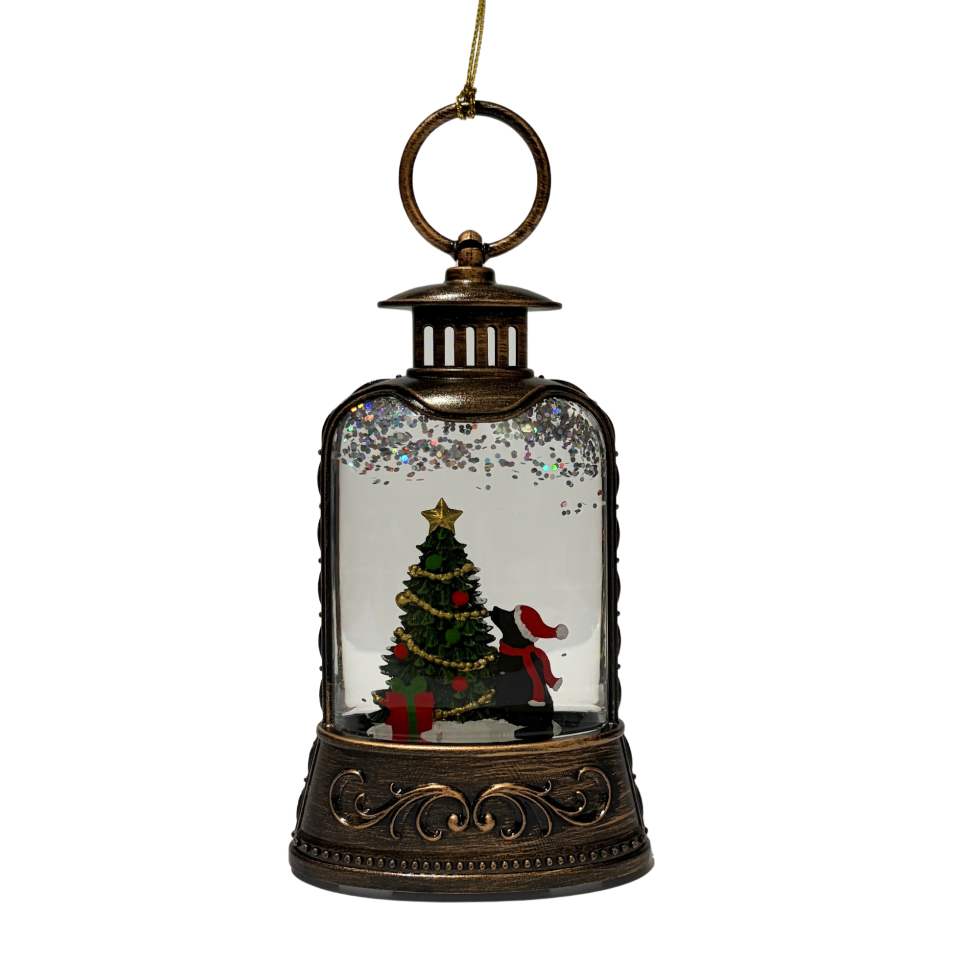 Mini lantern with a dog in a Santa hat looking at a decorated Christmas tree and swirling glitter