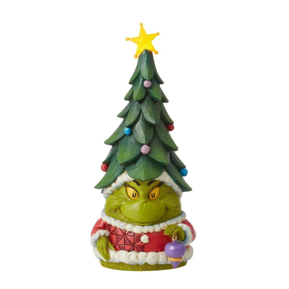 Front view of Grinch figurine wearing a decorated Christmas tree as a hat with star topper, holding a bauble, red coat base
