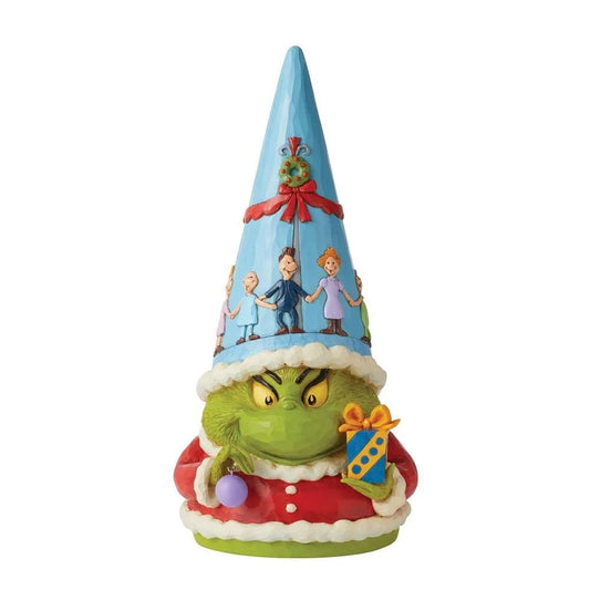 Grinch gnome figurine front view; scowling green face, blue cone hat with wreath, Who characters, holding a wrapped gift