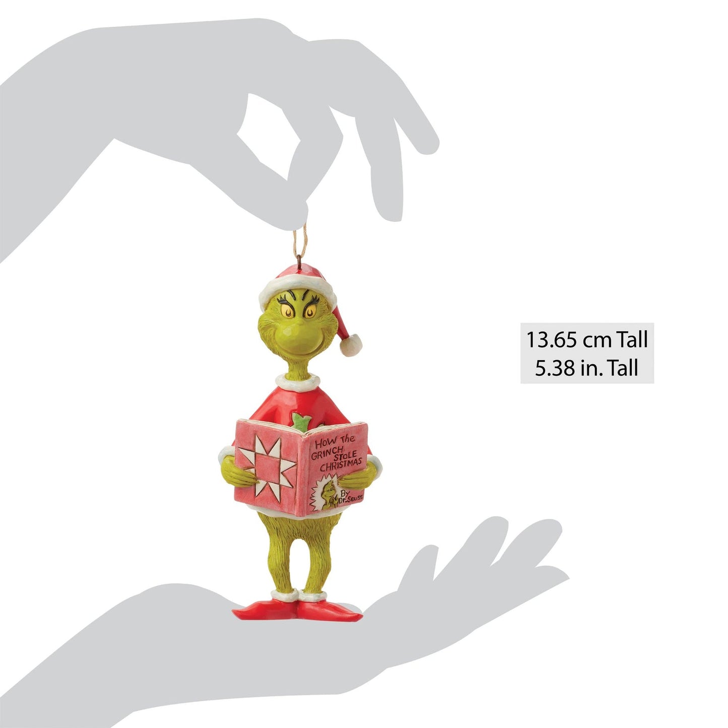 Grinch ornament shown between two silhouetted hands indicating size of 13.65 cm / 5.38 inches tall
