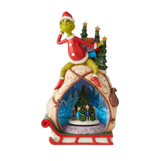 Grinch sleigh figurine with illuminated blue interior diorama showing Who characters dancing around a Christmas tree