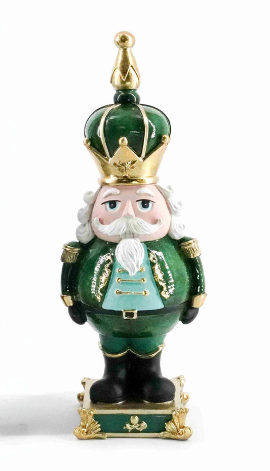 Emerald green and gold nutcracker figurine with ornate crown and detailed base
