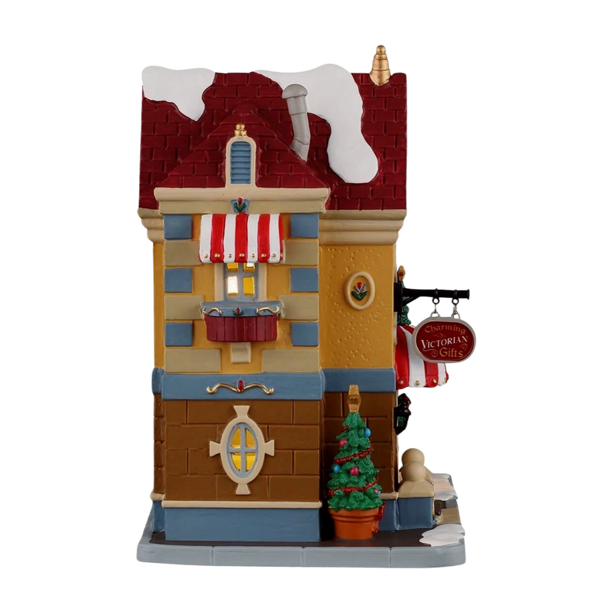 Right view of Lemax Charming Victorian Gifts shop figurine showing red roof with snow, lit windows, and wrapped gifts
