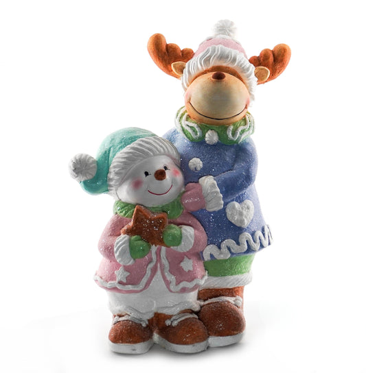 Reindeer and snowman Christmas figurine in winter clothing holding a star