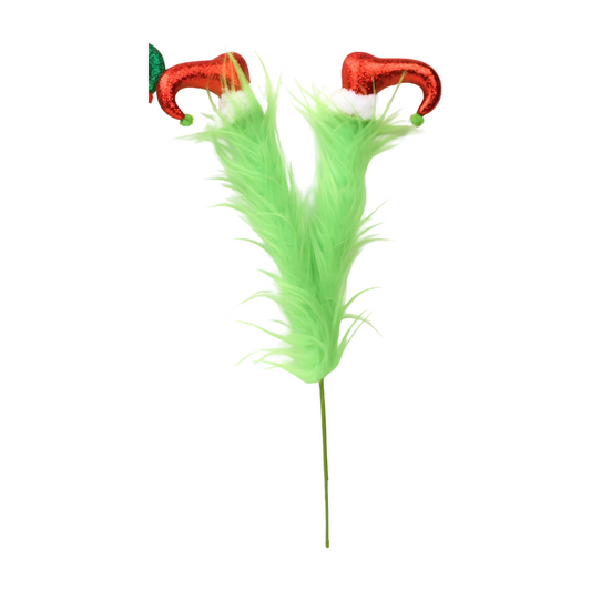 Pair of fluffy green elf legs with red glittery elf shoes on a decorative pick