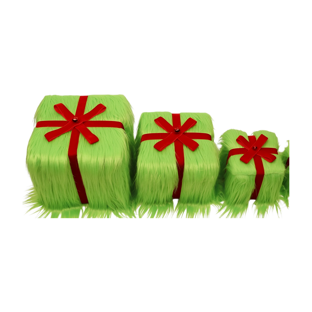 Set of three green furry gift boxes with red ribbons and bows