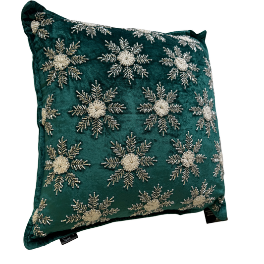 Hand-beaded green velvet Christmas cushion with silver snowflake design