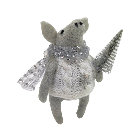 Grey felt pig ornament in a cream knitted jumper holding a silver glitter tree with sequin scarf